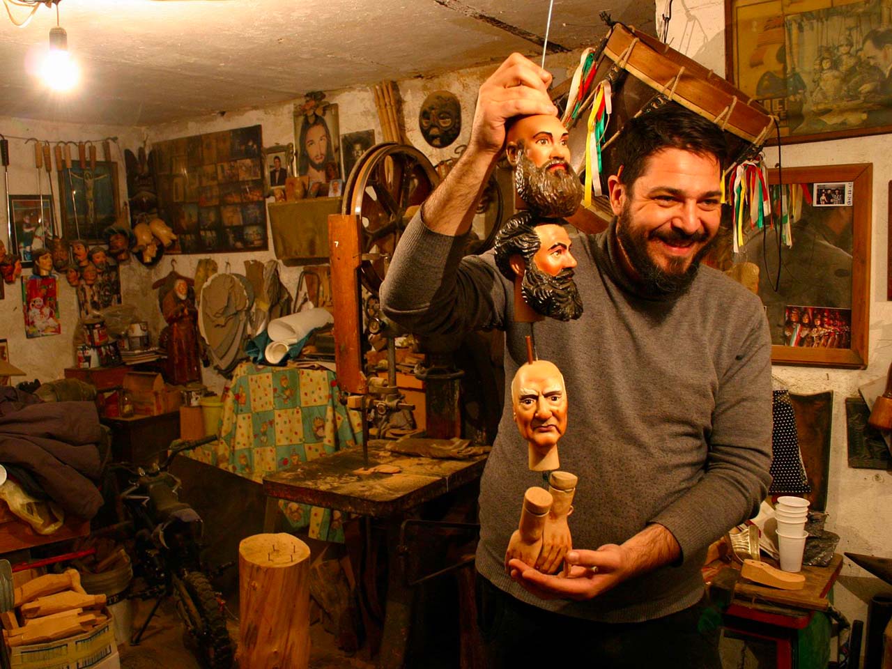 Salvo's workshop, the puppeteer of the Capo market in Palermo.